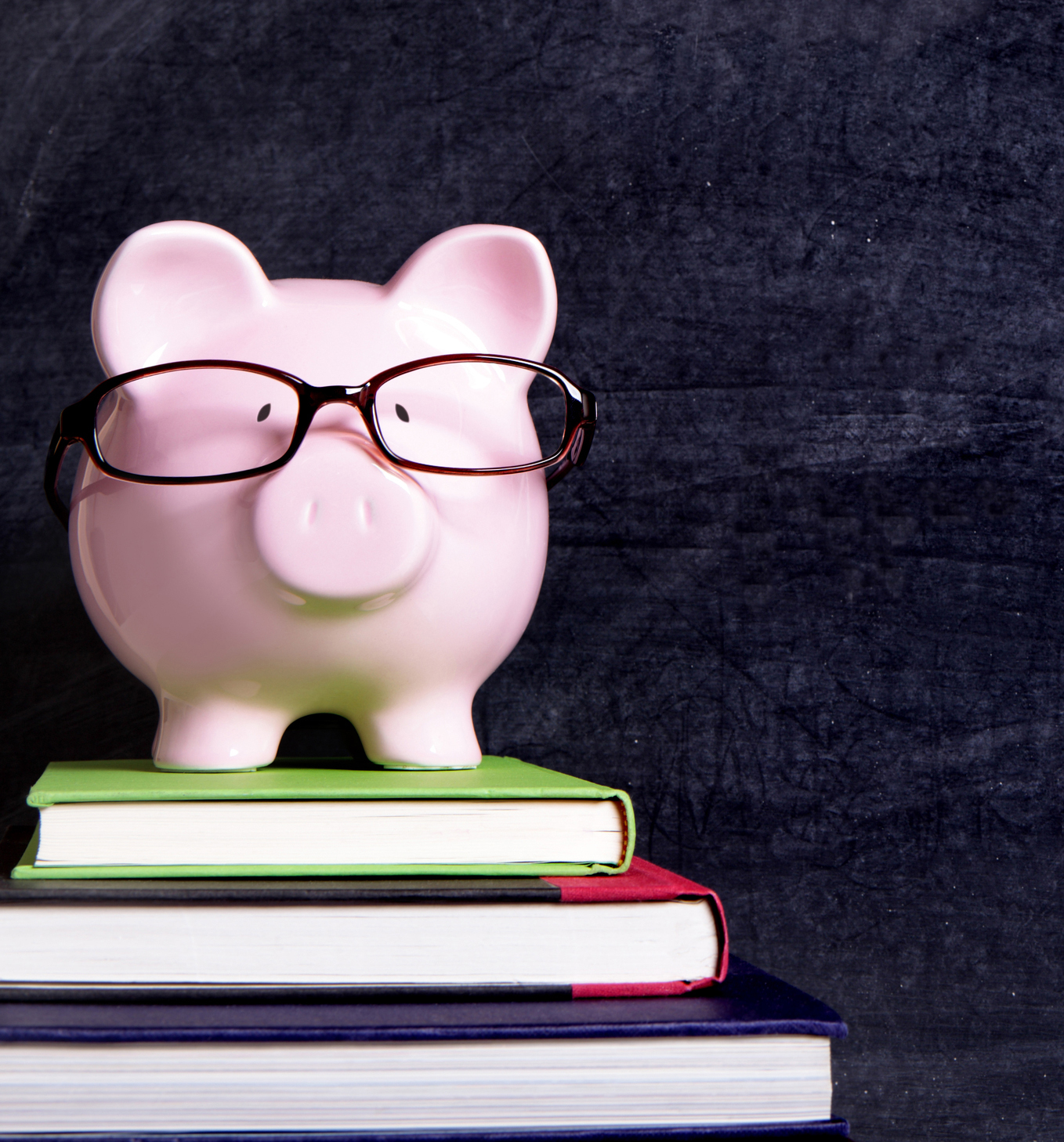Piggy bank with glasses and blackboard